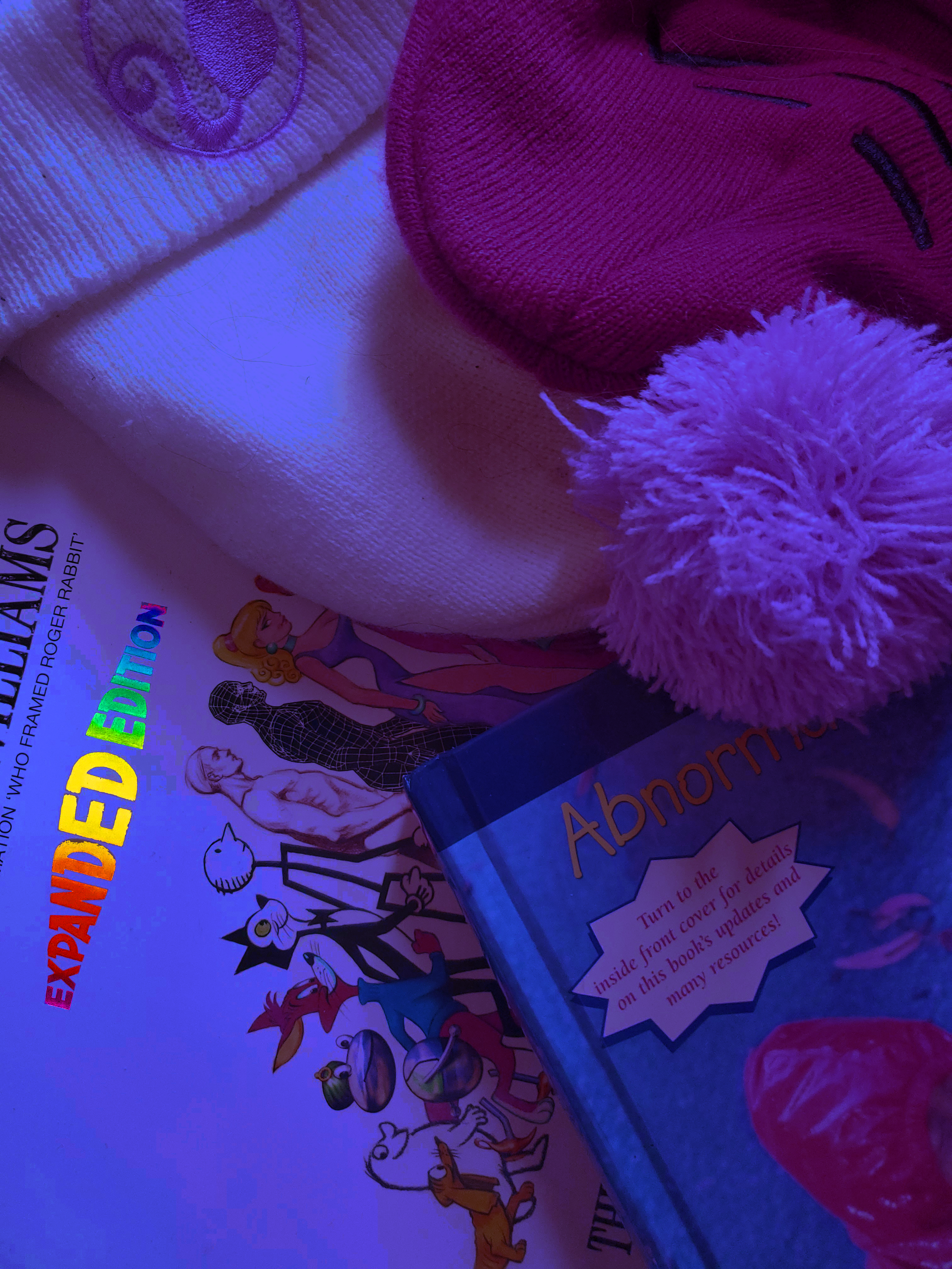 Interactive artwork of a bedroom with various clickable elements.